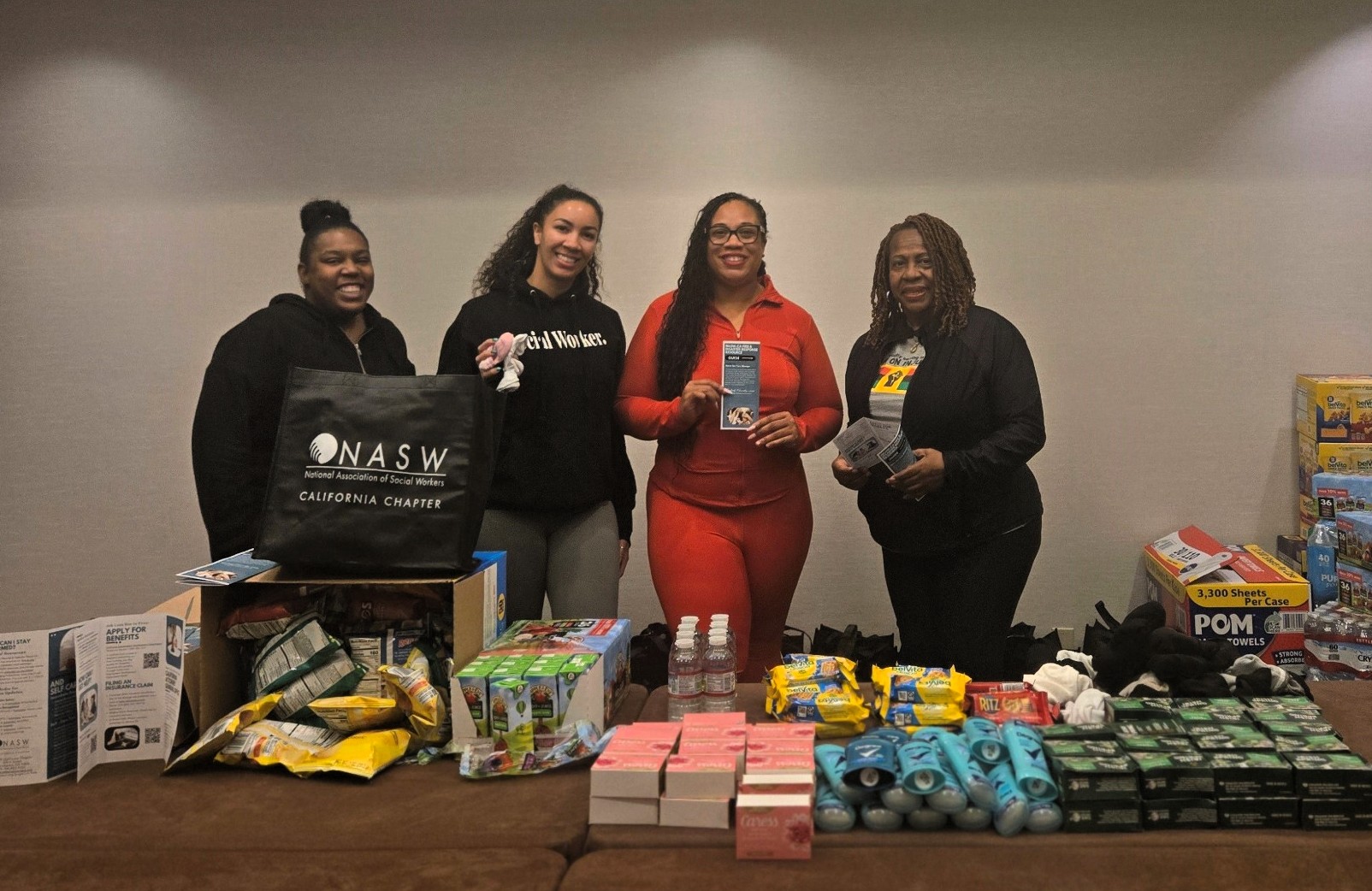 Teauania Charles, Marya Wright, Kimberly Warmsley, Gwen Bouie-Haynes with donations for those impacted by California Wildfires